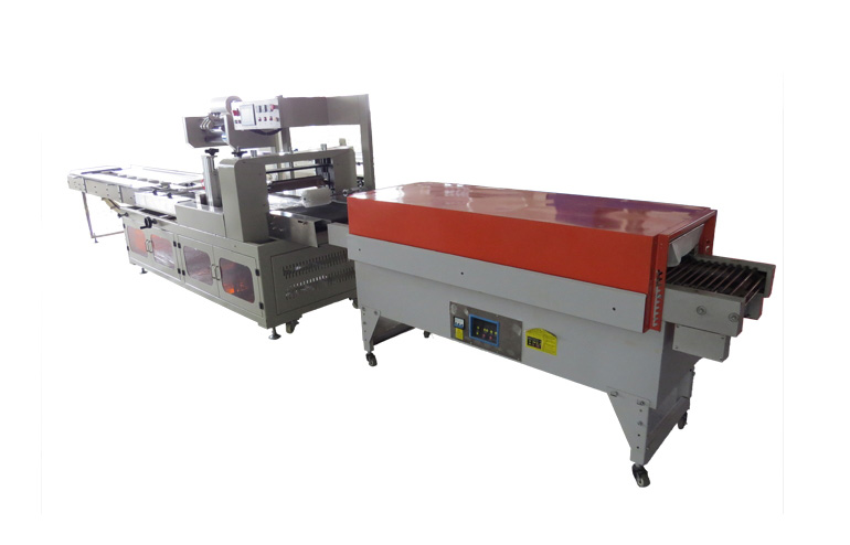 Shrink wrapping machines